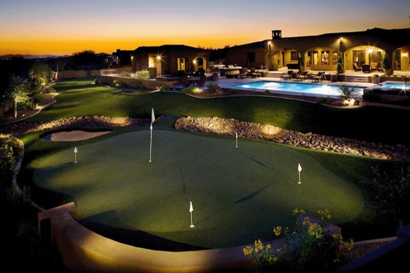 Southwest Greens of Jacksonville artificial golf green with sand trap at luxury home