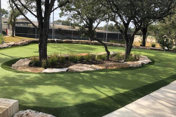Jacksonville residential backyard putting green grass